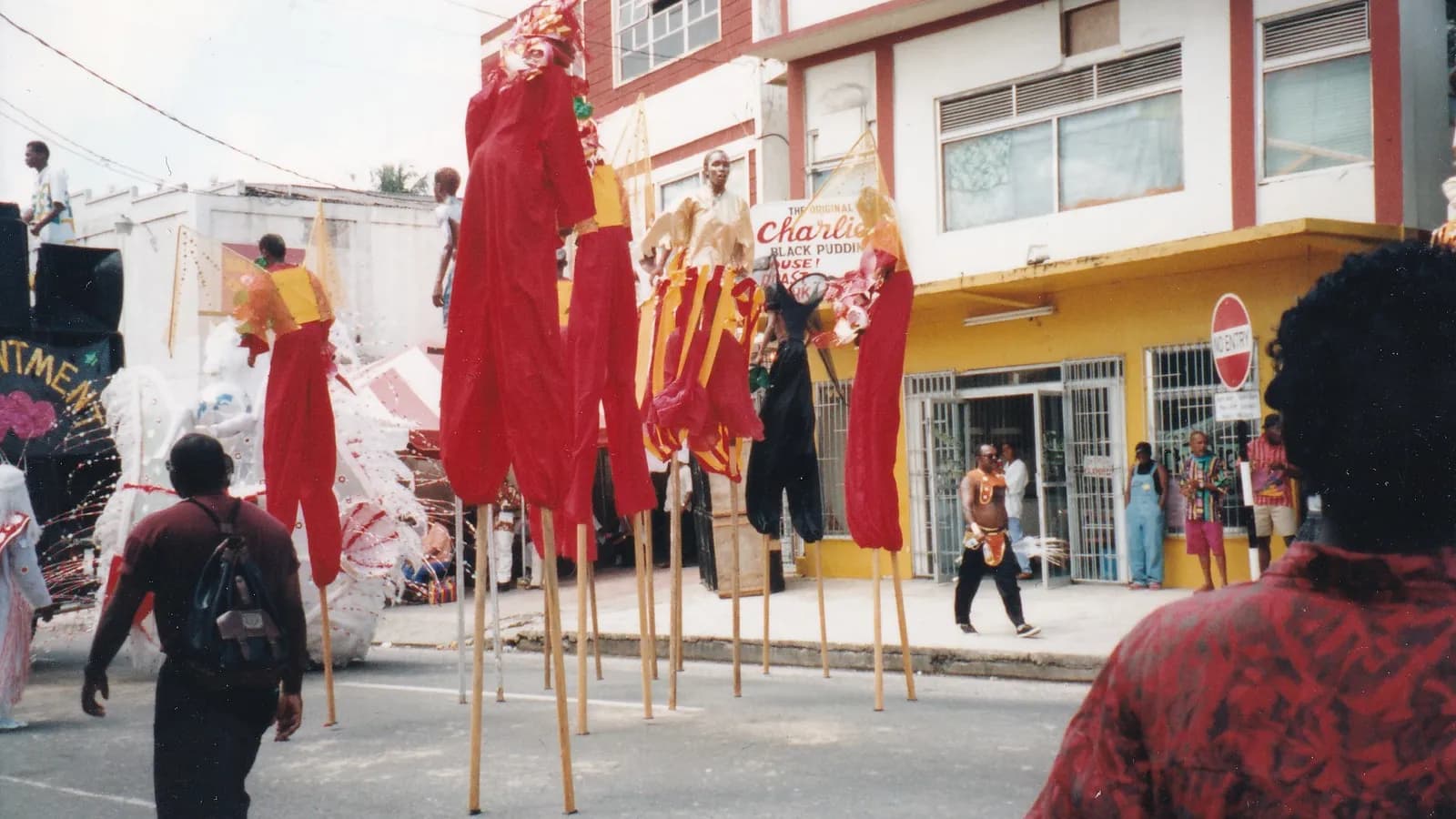 Moko Jumbie: The Stiltwalkers of Carnival